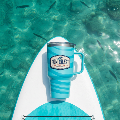 Sky blue wave stripe tumbler on paddleboard